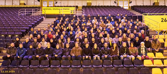 Participants of NOEKS 13 in the world's best stadium A groupshot of the participants of NOEKS 13 sitting on the stadium grandstand in the world's best football arena